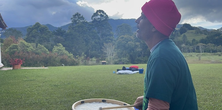Making music surrounded by mountain scenery at Ayahuasca House Retreat in Medellín, Antioquia, Colombia