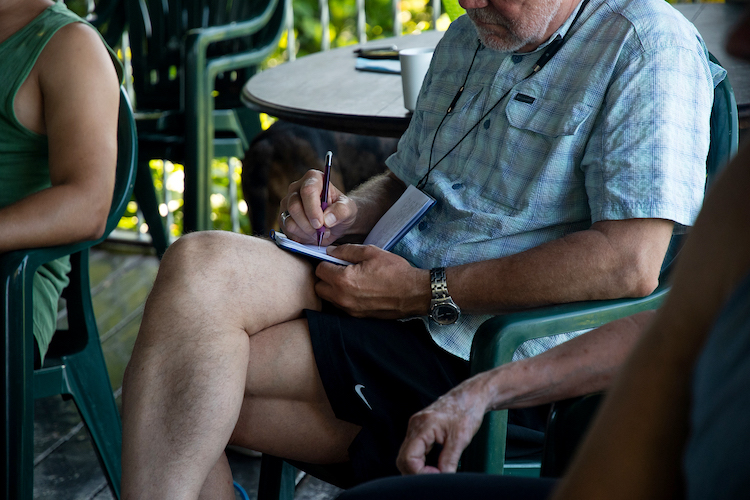 Note taking during an integration session - MycoMeditations Psilocybin Mushroom Retreat in Treasure Beach, Jamaica