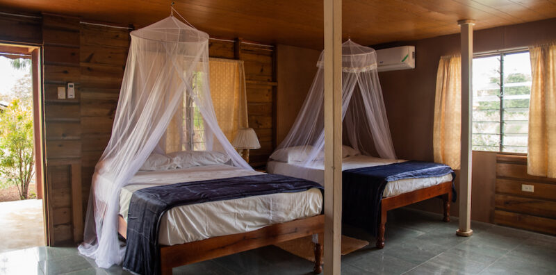 Double bed at MycoMeditations Psilocybin Mushroom Retreat in Treasure Beach, Jamaica