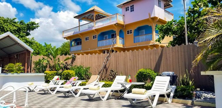 Chairs by the pool at Zion Life Retreat Psilocybin Yallahs St. Thomas Jamaica.