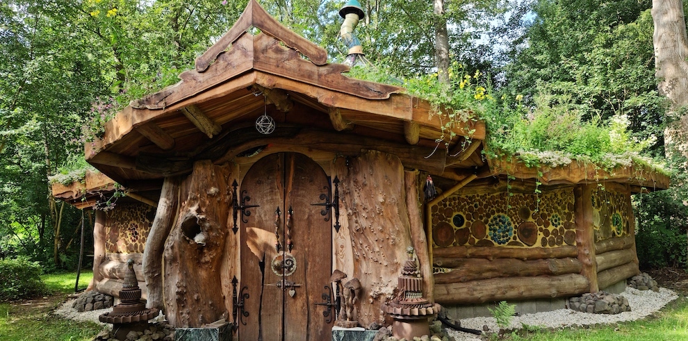 The front door of the nature temple at Earth Awareness Psilocybin Retreat in Teuge, Netherlands