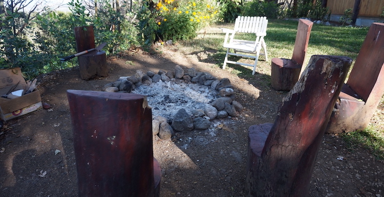 Ceremonial fire pit and sharing circle at Om Jungle Medicine Ayahuasca Retreat in Samara, Guanacaste, Costa Rica