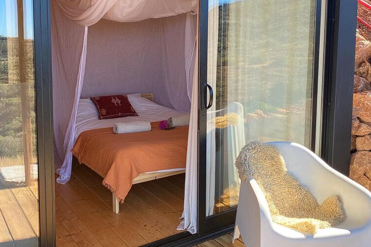 The private bed room with mountain view at Intuitive Kasham Psilocybin Retreat Faro Portugal