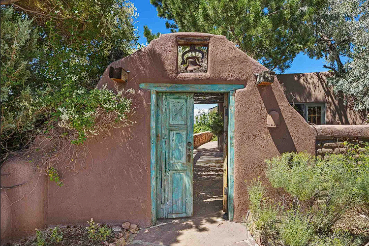 A warm welcome of Antique entrance gate at Psychedelic Journey in Santa Fe New Mexico