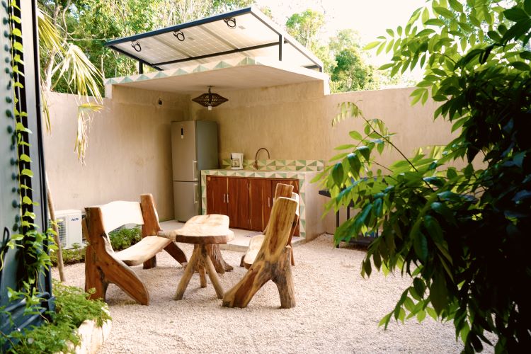 Savor the joys of al fresco dining at our outdoor shared kitchen and grill. Where good food and great company create unforgettable moments at Bufo Alvarius Sanctuary Bufo Alvarius Retreat in Tulum, Mexico
