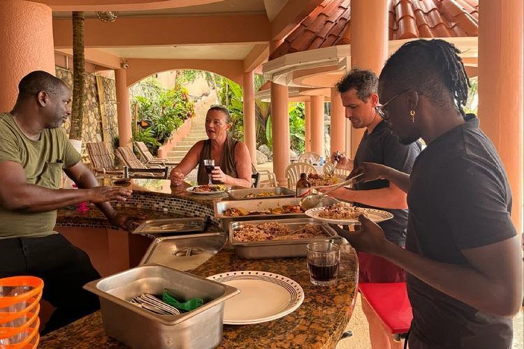 Fueling up and forging connections, one bite at a time. The cafeteria camaraderie brings flavor to our day and bonds to our conversations here at Mycelia Psilocybin Retreat in Ocho Rios, Jamaica