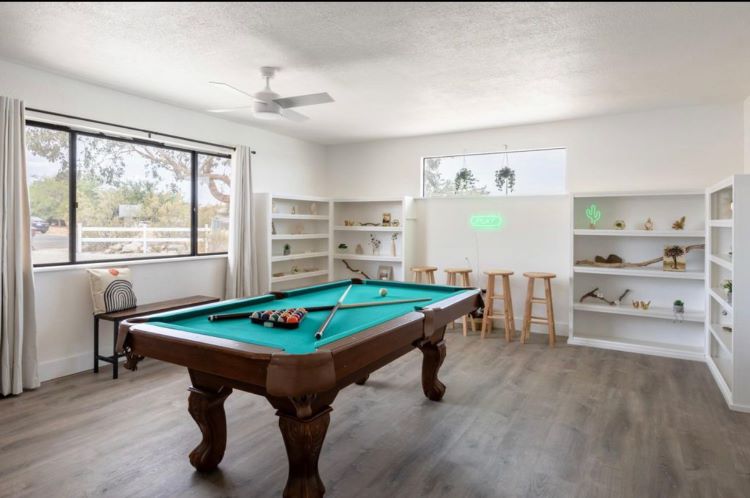 Where strategy meets relaxation. The billiard room is a haven for friendly competition and leisure, where every shot is a moment of skill and camaraderie at Nektar Healing Retreat Los Angeles California