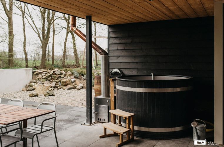 Dip into pure bliss with a view. Our retreat center's jacuzzi offers the ultimate relaxation, where bubbles meet breathtaking scenery here at A Whole New High Psilocybin Retreat in Amsterdam, Netherlands