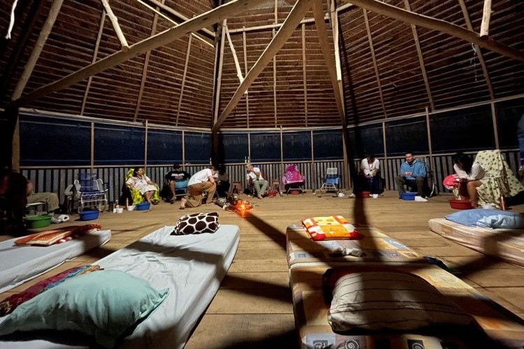 Nurturing the Soul: Inside the Maloca, Where Healing Magic Unfolds in the Night here at Casa Del Maestro Medicina Ayahuasca Retreat in Jenaro Herrera, Peru