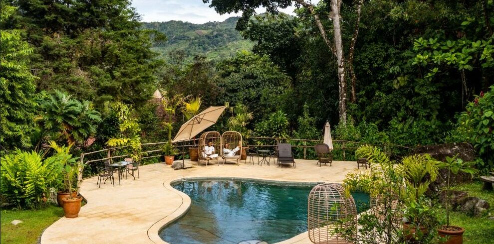 Lost in the tranquil embrace of nature's beauty, where the forest whispers its secrets and the pool reflects the sky's serene hues here at Mushroom Tao Psilocybin Retreat in Dominical, Costa Rica