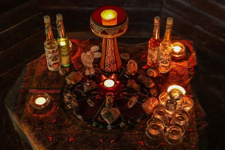 Sacred Space Illuminated: Our Retreat Center's Altar Aglow with the Warmth of Candlelight here at Nimea Kaya Healing Center Ayahuasca Retreat in Pucallpa Ucayali, Peru
