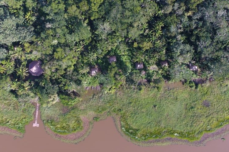 Breathtaking bird's-eye view of our lakeside haven here at Pisatahua Ayahuasca Retreat in Pisatahua, Boliva