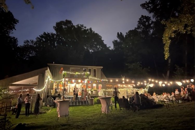 Enchanted Evening: A Retreat Ceremony and Dinner Bathed in the Warm Glow of Lights here at Union Tribe Church Psychedelic Retreat in Washington, D.C.