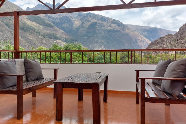 Nature's grandeur meets cozy elegance in our outdoor living room retreat. Lounge amidst the mountains, where every breath is infused with crisp air and every moment is framed by breathtaking views here at Casa Galatica Psychedelic Retreat in the Sacred Valley of Peru.