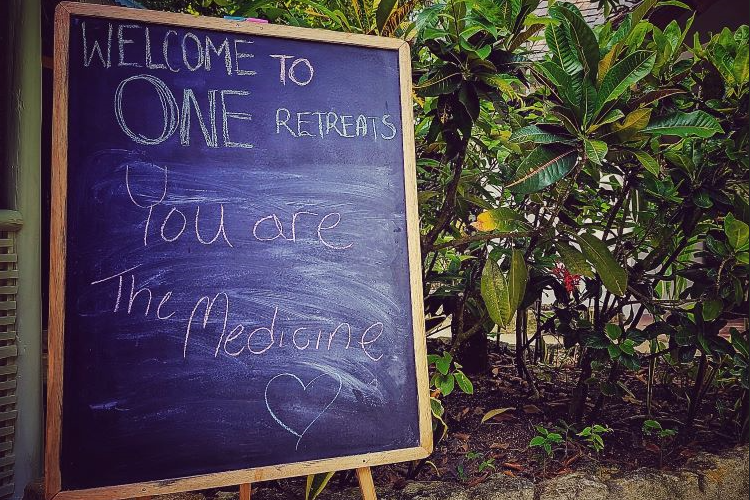 Step into a realm of healing and warmth. Our welcoming sign whispers, 'Welcome! You are the medicine.' Embrace the power within, as you embark on a journey of self-discovery and wellness. Here, every step is a dose of self-love, and every moment is a remedy for the soul here at ONE Retreats Psilocybin Retreats in West End, Negril, Jamaica.
