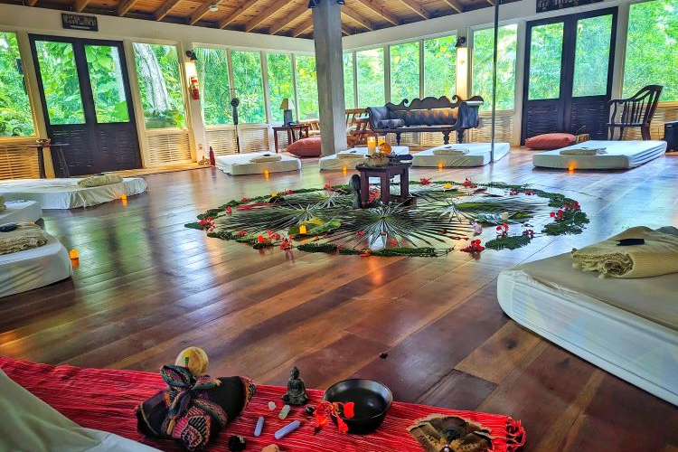 Capturing a moment of sacred connection within the retreat walls. In this ceremonial space, hearts converge, energies align, and a shared journey unfolds. Here, every ritual is a thread in the fabric of transformation here at ONE Retreats Psilocybin Retreats in West End, Negril, Jamaica.