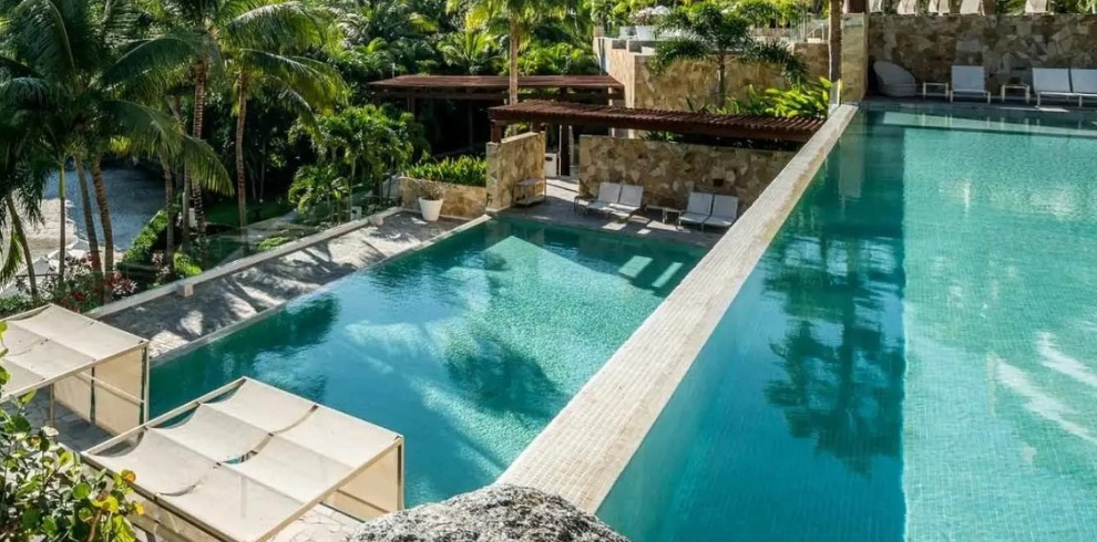 Dive into serenity with a breathtaking view. This poolside paradise is the perfect blend of relaxation and awe-inspiring beauty here at Sayulita Wellness Psilocybin 7 Day Group Platinum Retreat in Sayulita, Mexico.