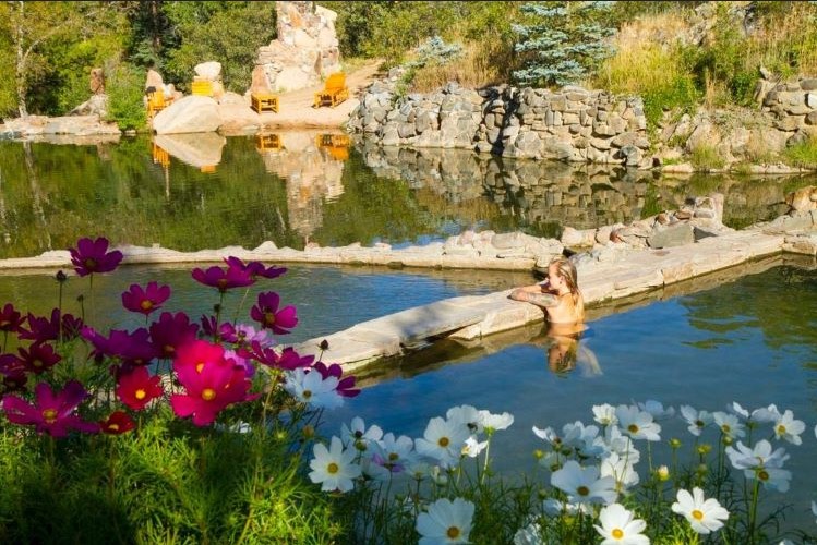 Tranquil Waters, Serene Minds: Uniting with Nature's Essence at the Retreat's Pool Sanctuary here at Medicine Woman Psilocybin Retreats Colorado, United States.