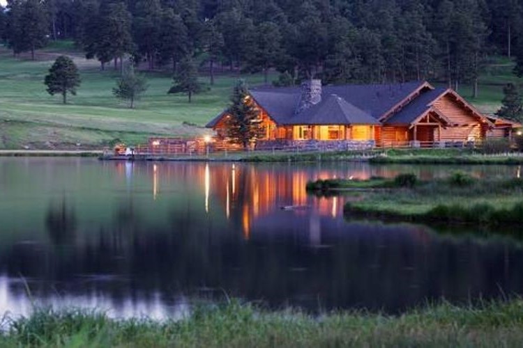 Evergreen Lake House: The crown jewel of our community retreat, where natural beauty meets timeless charm for an experience that enchants the soul here at Psilocybin Self Discovery Retreat Colorado, United States.